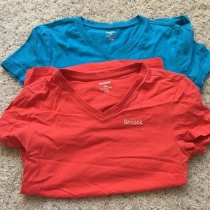 FREE With Purchase! Two Reebok exercise shirts